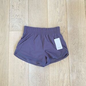Athleta high rise mesh racer shorts.